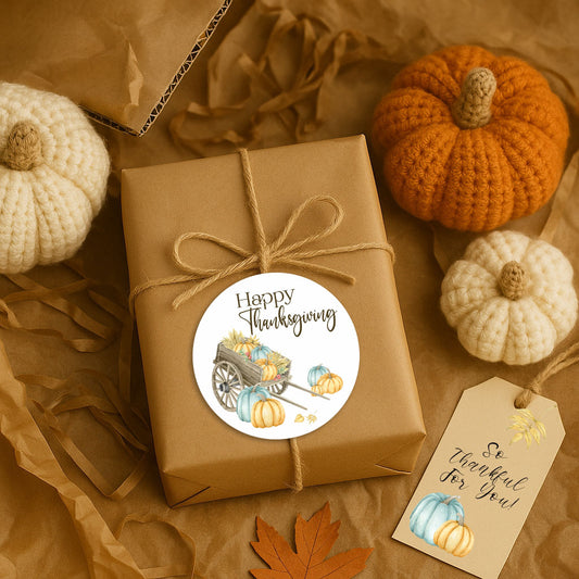 Autumn harvest Thanksgiving sticker on kraft box with crocheted pumpkins, leaves, and blank gift tag for fall packaging.