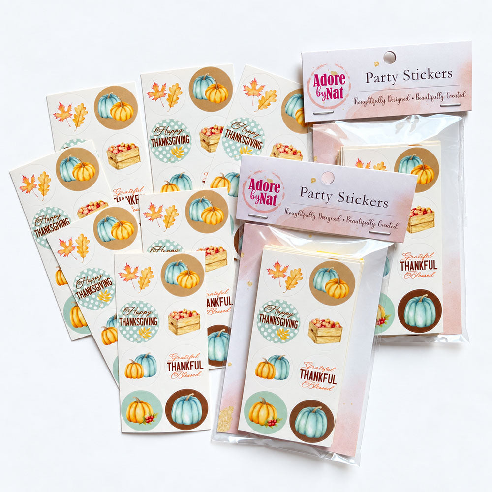 Blue pumpkin Thanksgiving candy sticker sheets shown beside their retail packaging, featuring eight coordinating autumn designs.