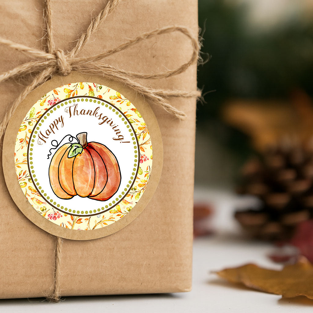 Gift box wrapped in brown paper with a 'Happy Thanksgiving' sticker featuring pumpkins.