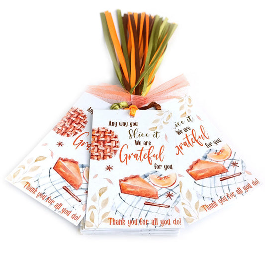 Set of 24 Pumpkin Pie Grateful For You gift tags with watercolor pie design and satin ribbons in fall colors, fanned out display.