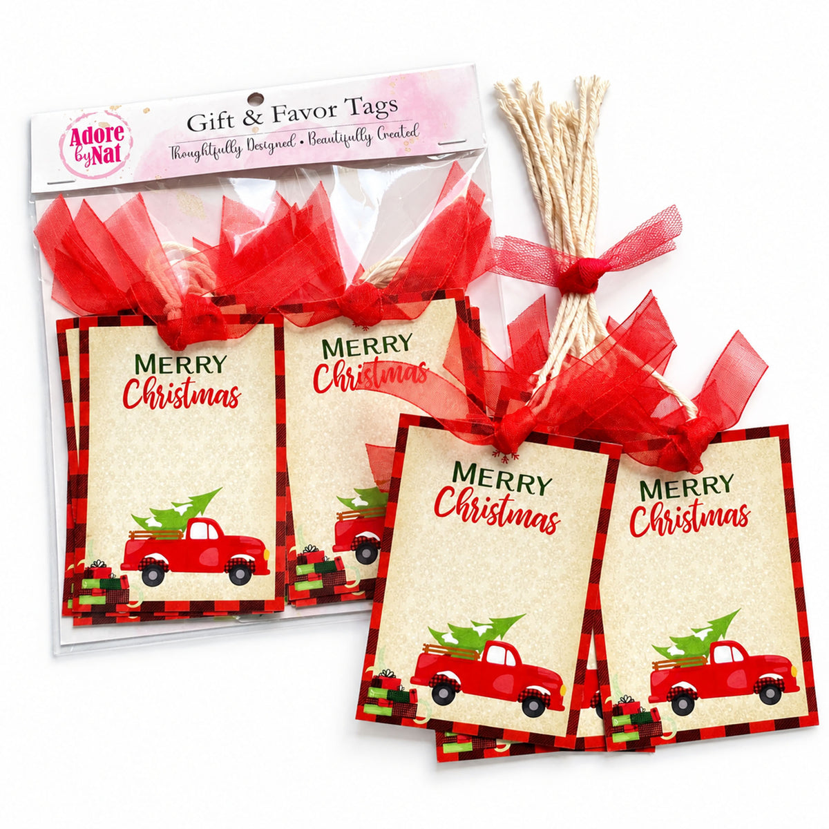 Packaged set of eight red truck Christmas gift tags displayed beside loose tags with red ribbon