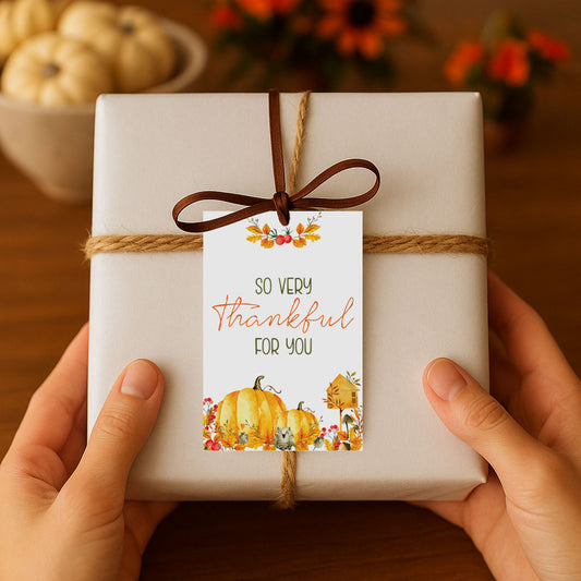 So Very Thankful For You favor tag tied with satin ribbon on a gift box, rustic fall gift wrapping idea.