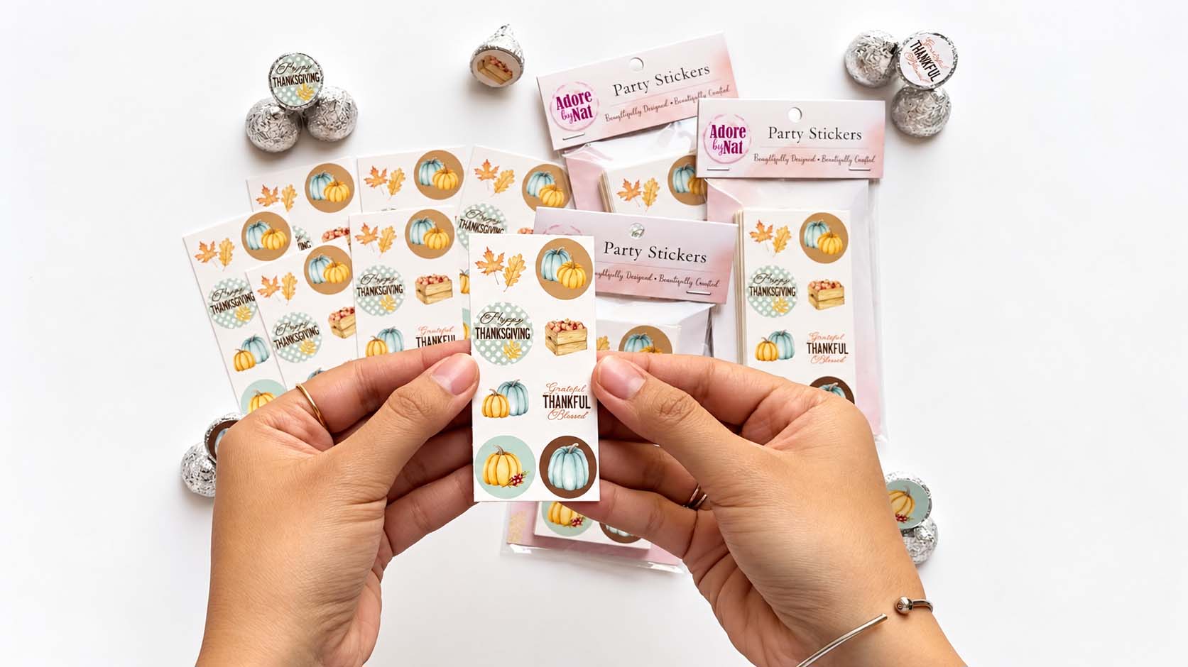 Video showing blue pumpkin Thanksgiving candy sticker sheets, packaging, and decorated chocolates.