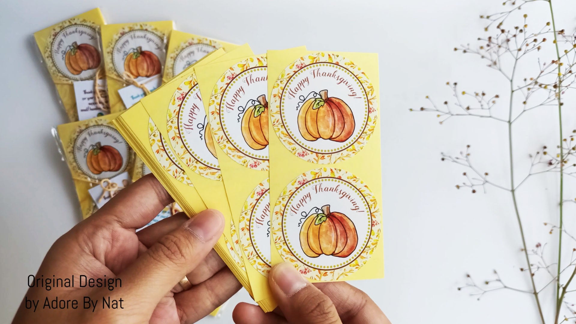 Short demo of Happy Thanksgiving Pumpkin Stickers – 2" round labels with watercolor pumpkin design, perfect for Thanksgiving favors, candy bags, and envelopes.